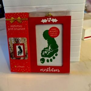 Mistletoes Print Ornament foot print ornament.